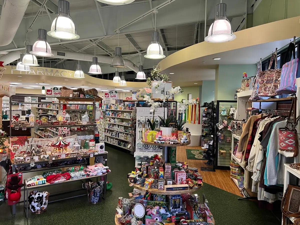 Shoppers browsing the gift shop at Economy Pharmacy Tulsa